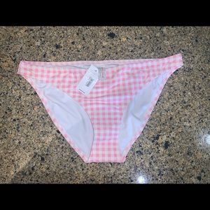 Darling Pink abs White checker bikini bottoms.